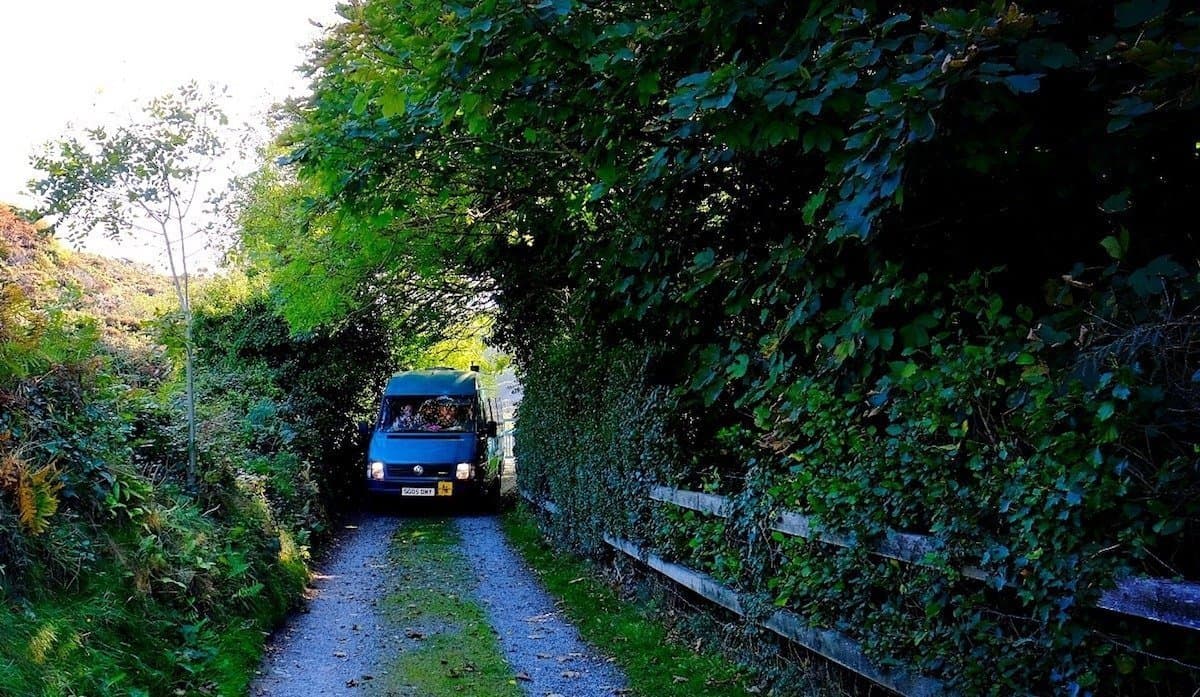campervan on small road, camping in october