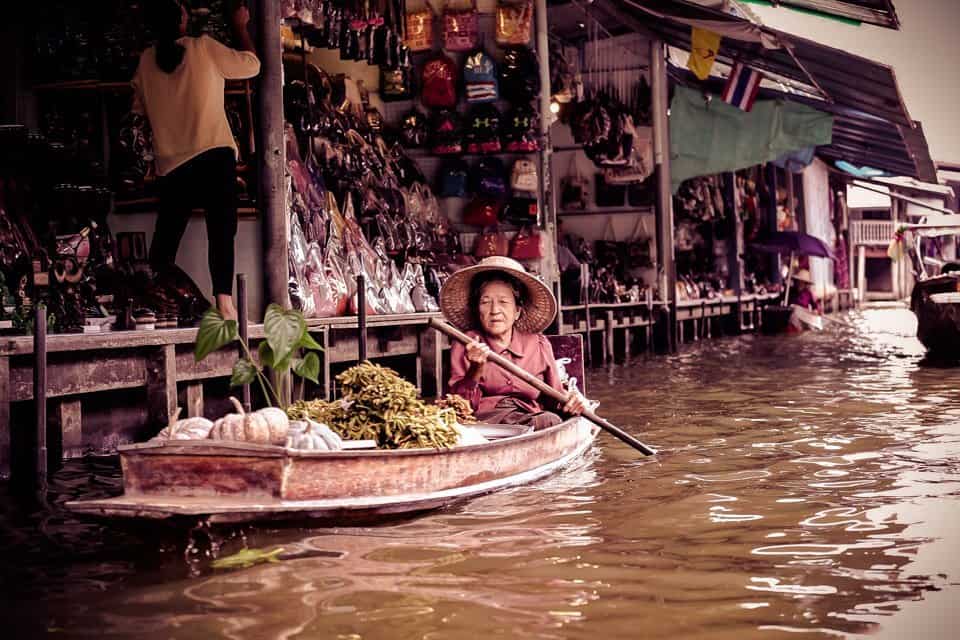 thai woman on  a boat in floating market